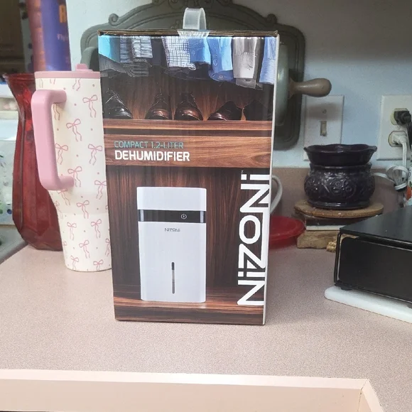 Compact 1.2-Liter White Dehumidifier - Picture 2 of 4